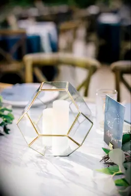 glass terrarium with candles