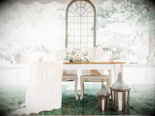 sweetheart table with wood lanterns