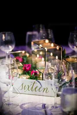 Spelled out gold and white wedding table numbers