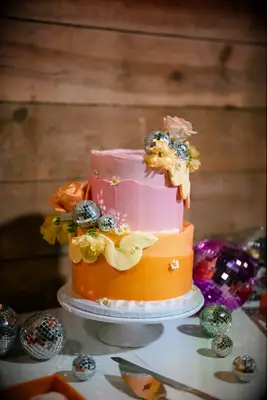 Disco wedding cake in pink and orange
