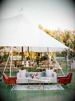 Cozy outdoor furniture at a fall wedding