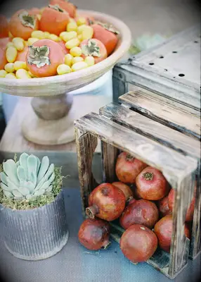 Fruit and veg decor at a fall wedding