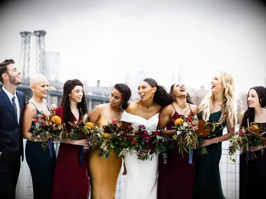 Jewel-tone dress colors at a fall wedding