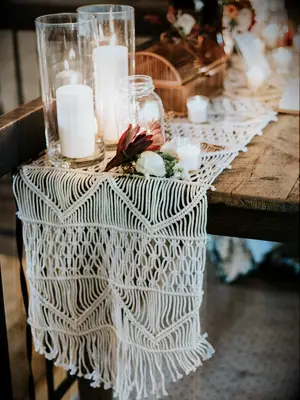 Macrame table runner at a fall wedding