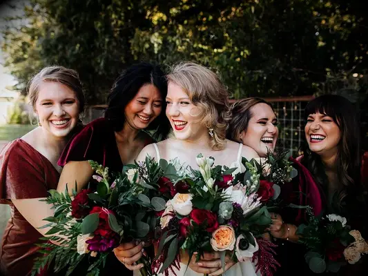 Jewel-toned wedding bouquets at a fall wedding
