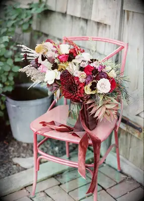 Bohemian-style floral arrangement at a fall wedding