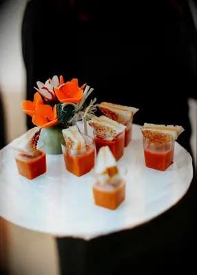 Grilled cheese sandwiches and tomato soup appetizers at a fall wedding