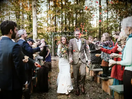 Fall wedding send-off with autumn leaves