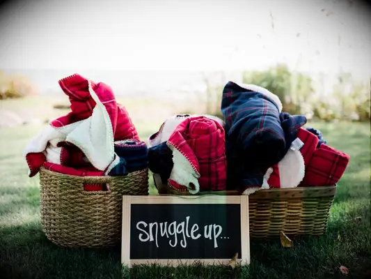 Soft blankets at a fall wedding