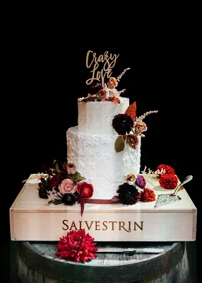 Small wedding cake with fall flowers