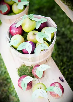 Apple escort cards at a fall wedding
