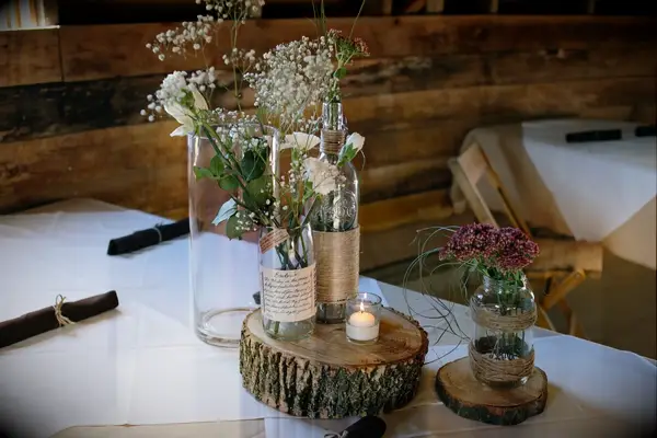 Rustic wedding flower and candle wedding centerpieces