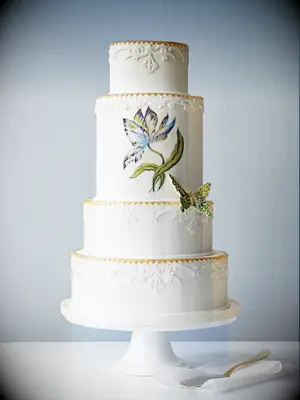 unique wedding cake with hand-painted flower