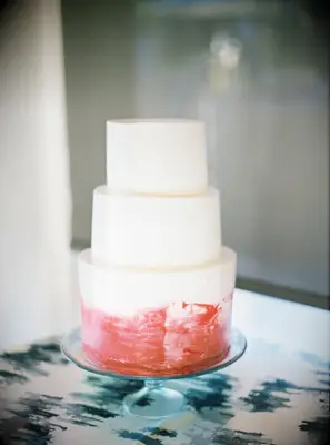 Red-and-white three-tier wedding cake