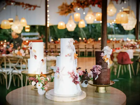 Trio of wedding cakes in shades of white and brown