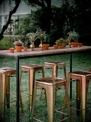 cocktail table with potted herb centerpiece