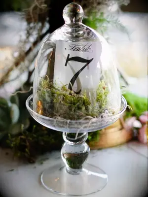 cloche with moss as wedding centerpiece