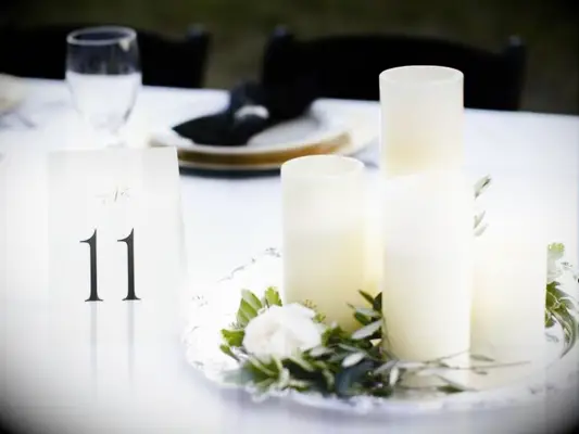 pillar candles on silver tray as wedding centerpiece