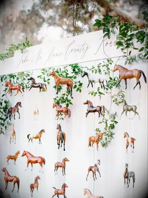 Whimsical horse wedding decor.