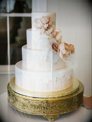 A romantic neutral-toned cake.