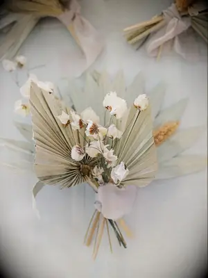 Beautiful neutral-toned boutonnieres. 