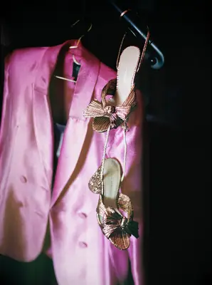 wear a monochromatic pink outfit on your wedding day