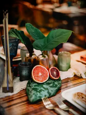 Citrus blood orange greenery wedding table centerpieces