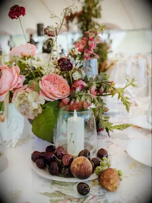Figs cherries flowers wedding table arrangements