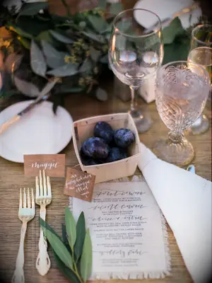 Plums greenery floral arrangements wedding centerpieces