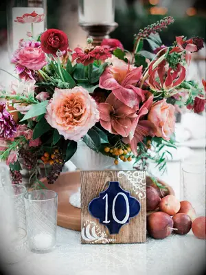 Red pink apples flower arrangements wedding centerpieces