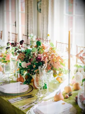 Sunlit pears apples stone fruit wedding table centerpieces