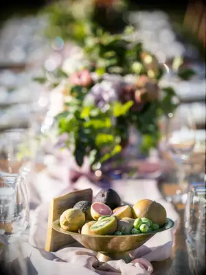 Kiwi fig citrus wedding centerpieces with silverware