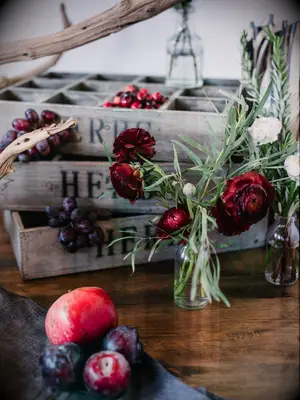 Plum red grape pomegranate wine-toned wedding floral arrangements
