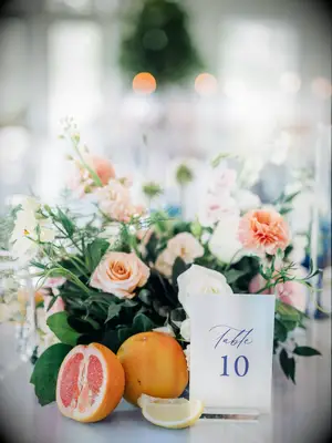 Citrus grapefruit roses table wedding centerpieces