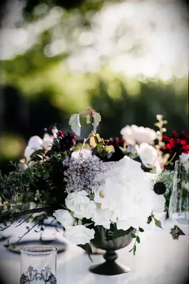 White and crimson floral centerpiece