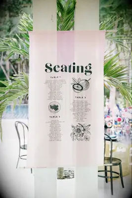 Linen seating chart with tropical illustrations
