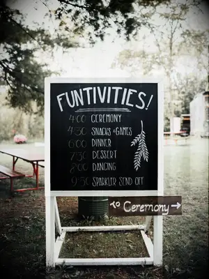 White and black chalkboard at DIY rustic wedding.