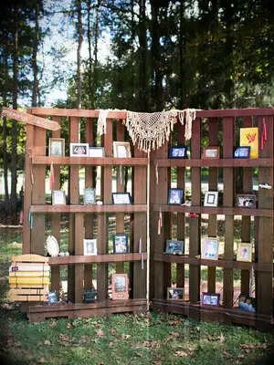 Rustic DIY wedding decor project of a wood memory wall. 