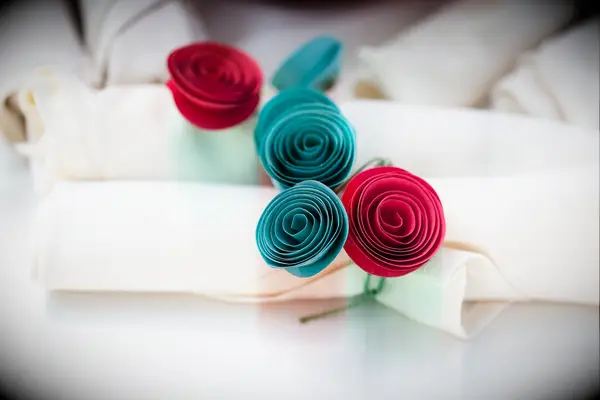 Paper flower napkin rings DIY wedding decor