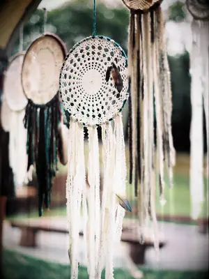 DIY bohemian wedding decoration of lace dreamcatchers. 