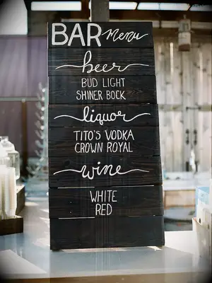 Rustic bar sign as a DIY wedding decor project.