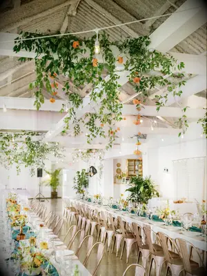 Delicate Greenery With Orange Carnations