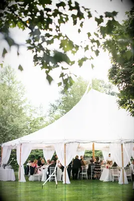 Outdoor white event tent reception