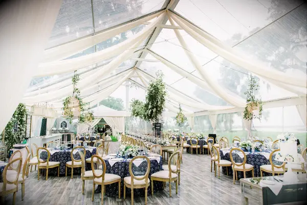 Partially draped wedding tent reception