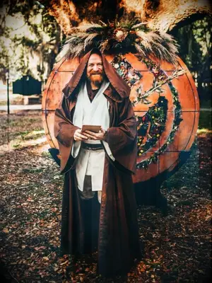 Wedding officiant dressed as Obi-Wan Kenobi from Star Wars
