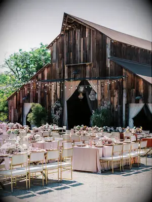 Rustic-meets-glam wedding reception at barn