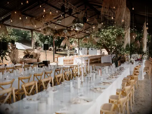 Gazebo wedding reception with hanging bulb decorations