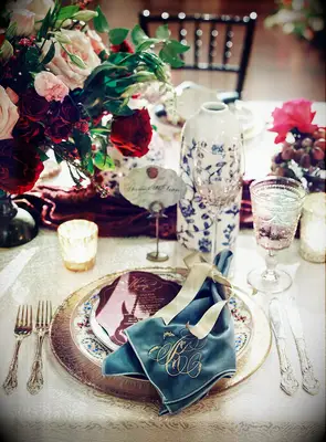 Monogrammed velvet napkins at wedding reception