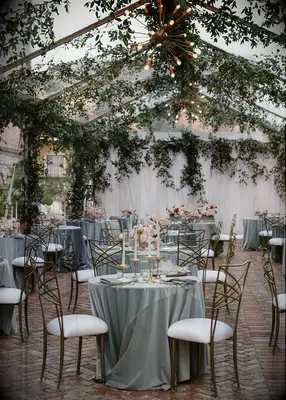 Effortless wedding reception decor with greenery