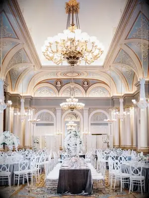 Glam wedding reception in ornate ballroom
